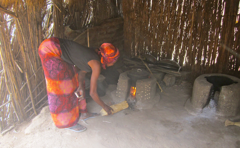 Women build improved cookstoves from free, locally available materials. Many realize a 50 to 70 percent reduction in firewood consumption.