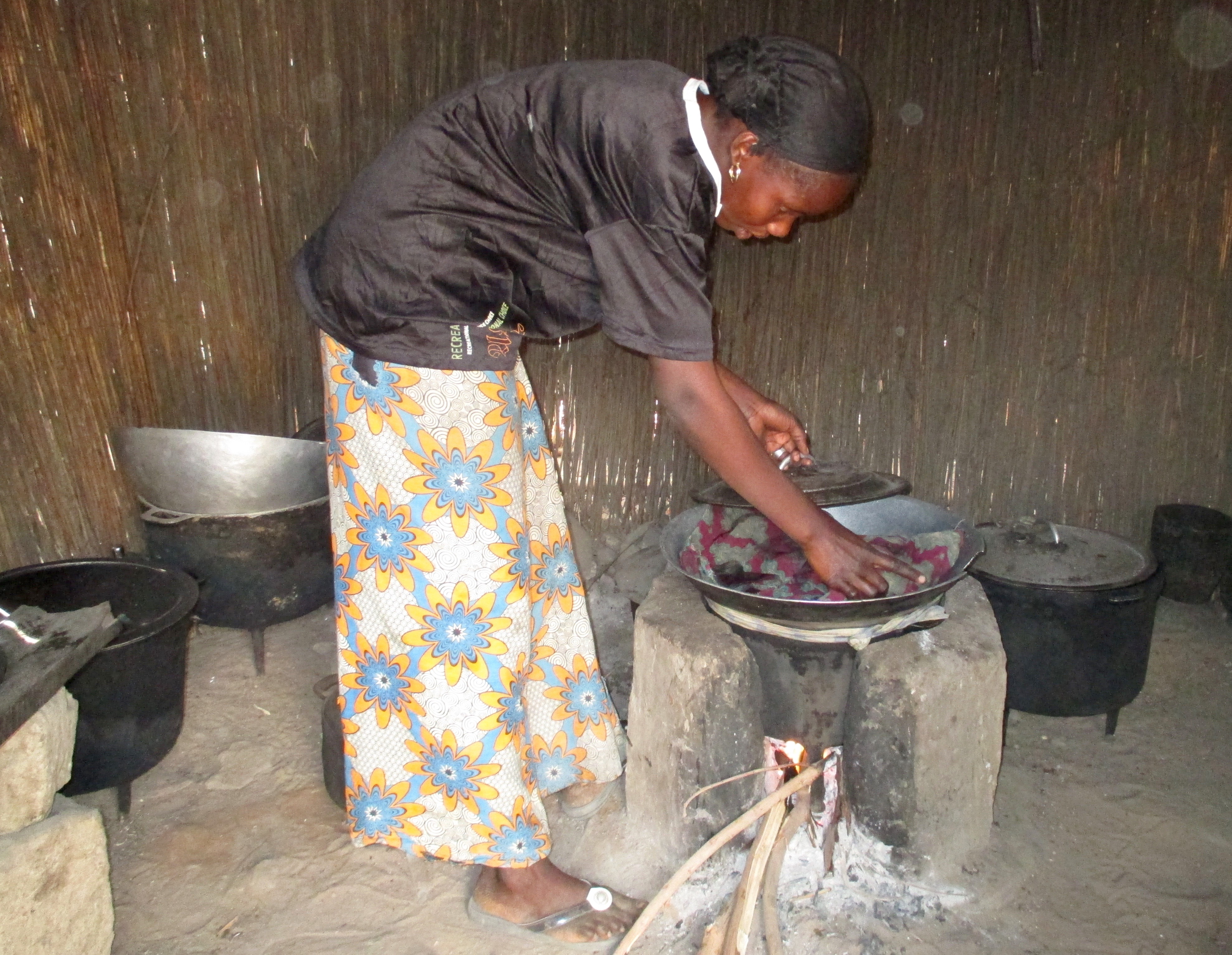 Fatou with her cookstove