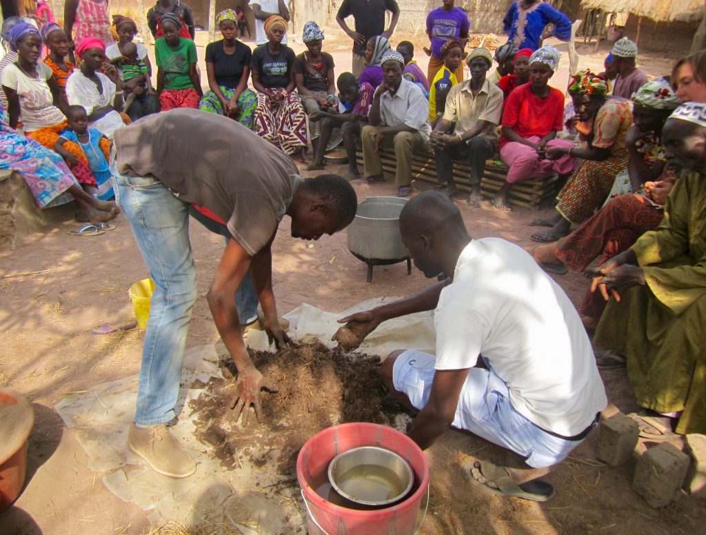 Improved Cookstove Trainings: Technicians demonstrating 
